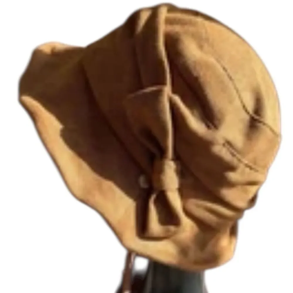Comhats vintage caramel cloche bucket hat with a chin strap and drawstring